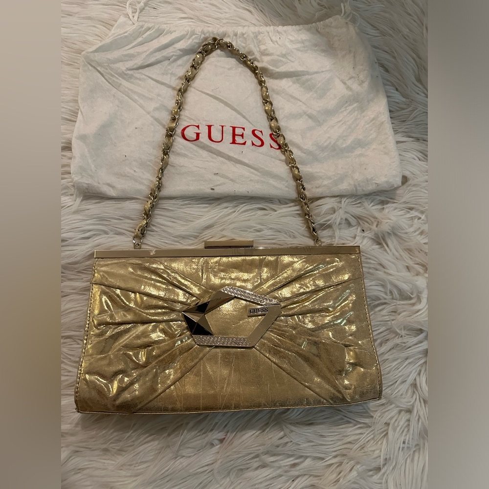 Guess clutch gold with dust bag